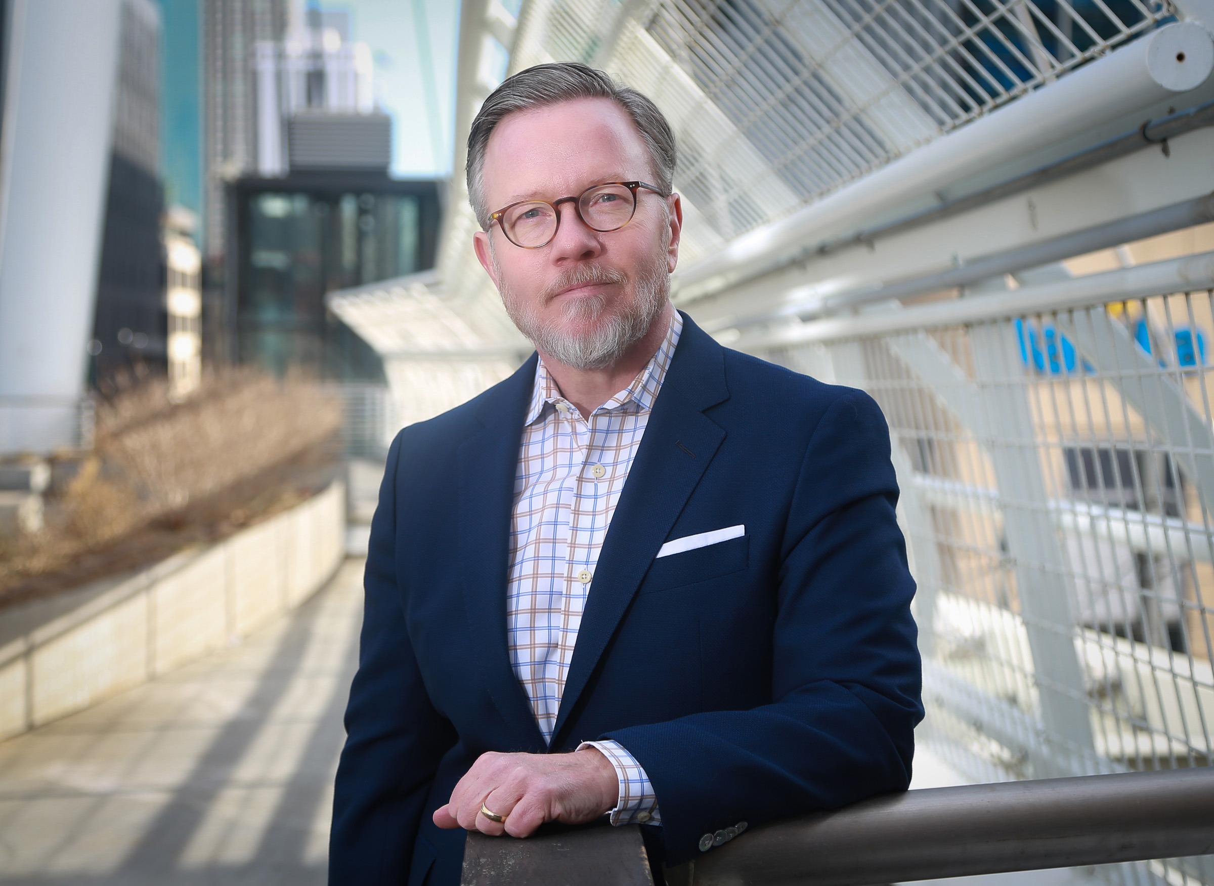 brand photo male executive denver city background
